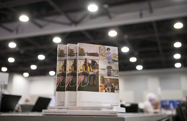 Copies of the federal budget are seen at the media lock-up, before being tabled by Minister of Finance Bill Morneau in the House of Commons on Parliament Hill, in Ottawa on Wednesday, March 22, 2017.