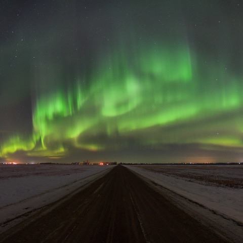 Jeff Wallace knew the aurora forecast was strong on March 1, 2017 - but had to wait some time to capture them brilliantly dancing.