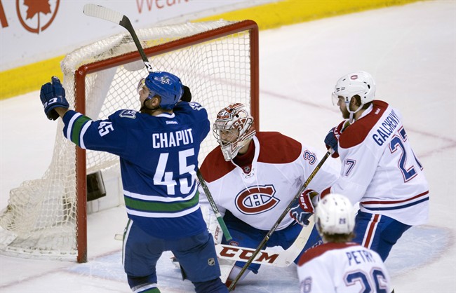 Vancouver Canucks centre Michael Chaput (45) celebrates his goal past Montreal Canadiens goalie Carey Price (31) during third period NHL action in Vancouver, B.C., Tuesday, March. 7, 2017. 