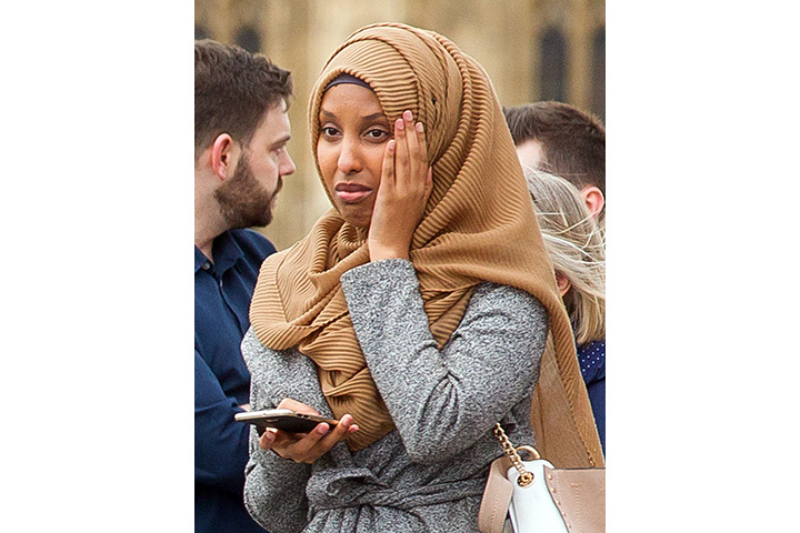 Muslim woman pictured walking past London attack victim slams those ‘who could not look beyond my attire’ - image