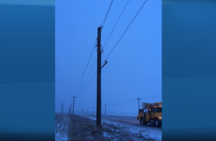 Manitoba Hydro crews work on an outage near MacGregor .