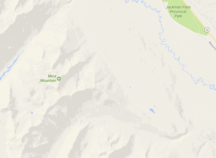 Crews are searching for two missing snowmobilers on Mica Mountain. 