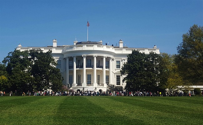 In this April 17, 2016 file photo, people visit the south lawn during the annual White House Spring Garden tours in Washington.