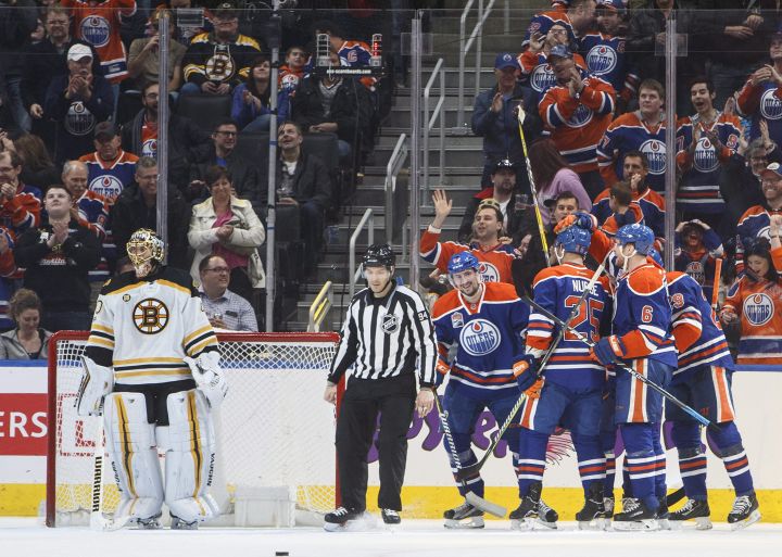 Edmonton Oilers celebrate a gaol against Boston Bruins goalie Tuukka Rask (40) during first period NHL action in Edmonton, Alta., on Thursday, March 16, 2017. 