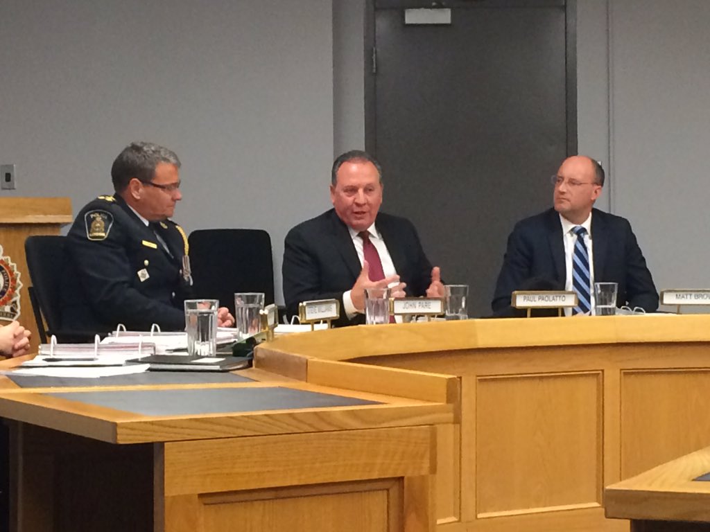 Outgoing police services board budget chair Paul Paolatto (centre) told the board he's considering a run for municipal office.