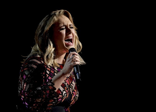Adele performs "Hello" at the 59th annual Grammy Awards in Los Angeles.