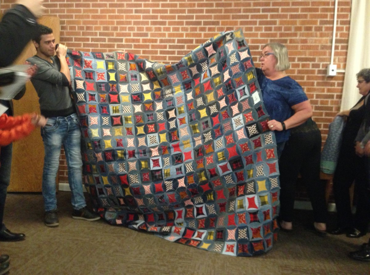 Local quilters create 14 quilts for new Syrian refugee arrivals in Winnipeg.