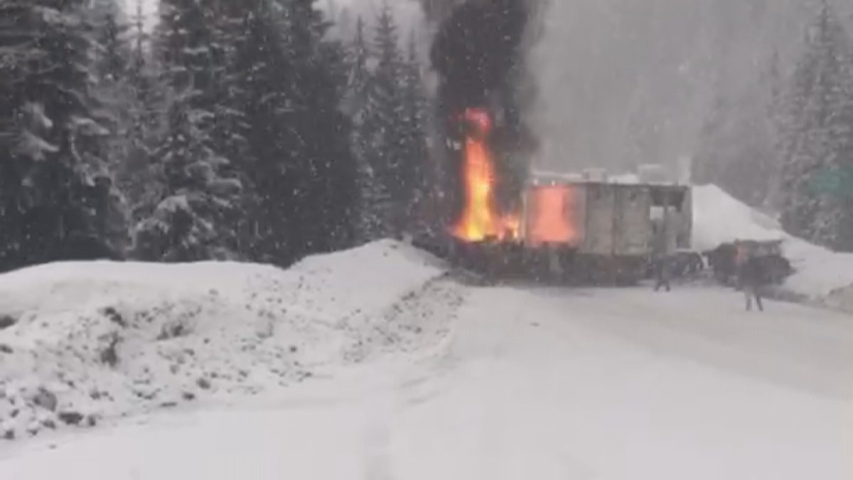 A semi-trailer truck bursts into flames on Highway 1 east of Revelstoke Monday morning after a multi-vehicle crash.