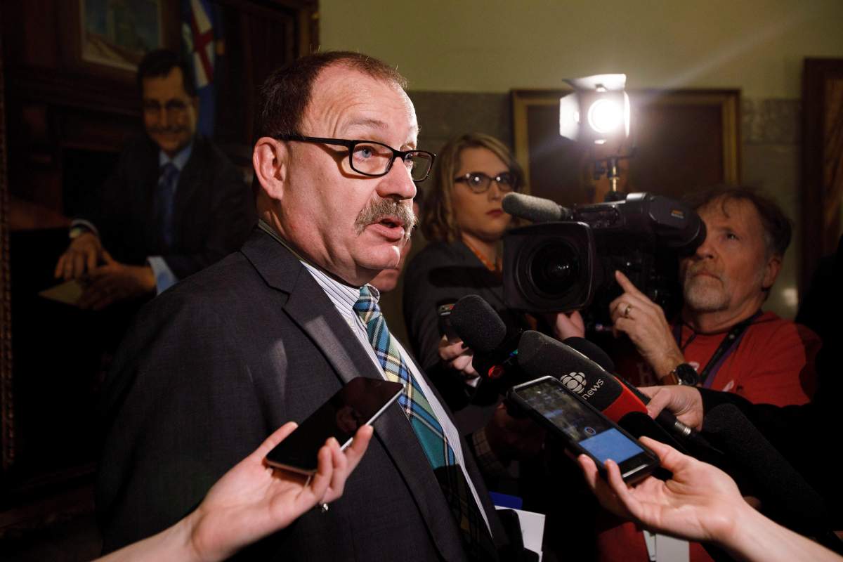 Former Progressive Conservative interim leader Ric McIver speaks to reporters at the Alberta Legislature Building in Edmonton, Alta., on Monday, March 20, 2017. THE CANADIAN PRESS/Codie McLachlan.
