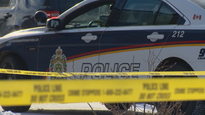 Saskatoon Police Service cruiser crime tape.