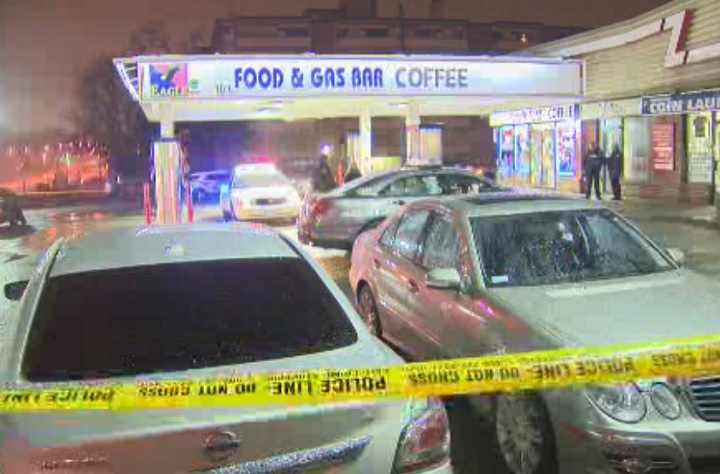 Police investigate at a gas station in Scarborough on March 27, 2017.