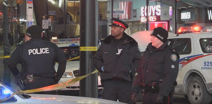 Toronto Police at the scene of a stabbing near Yonge and Dundas Friday night.