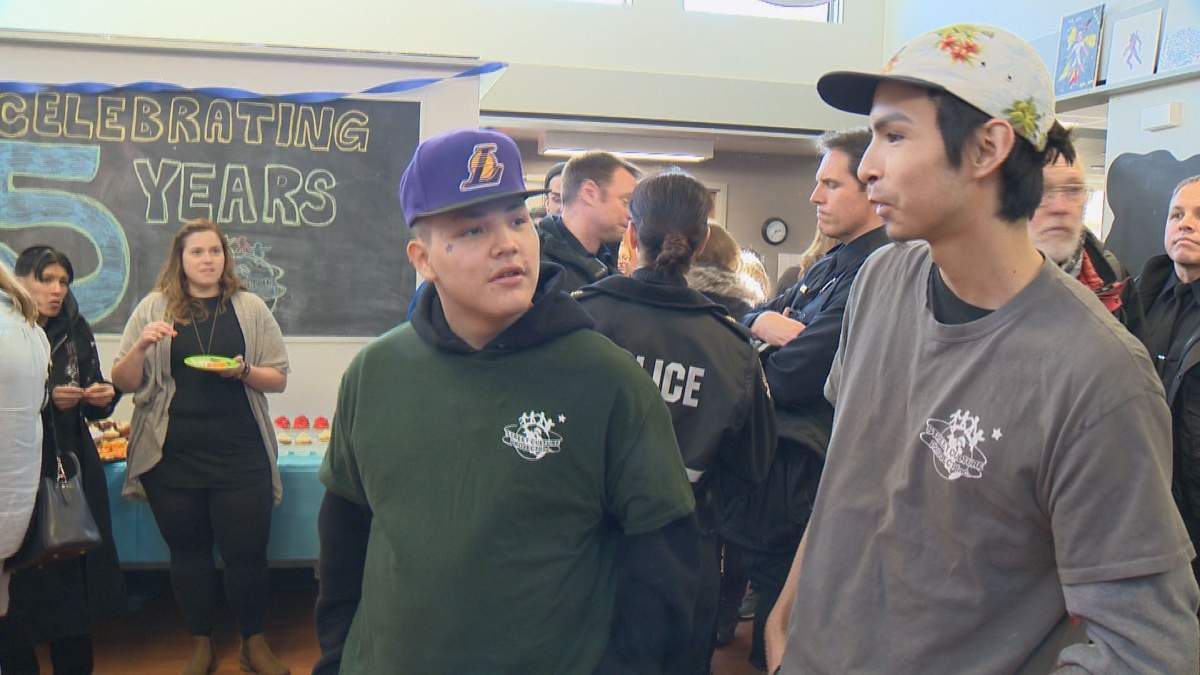 Derick Kakakawy (left) at the fifth anniversary of Downtown Browne\'s Youth Emergency Shelter.