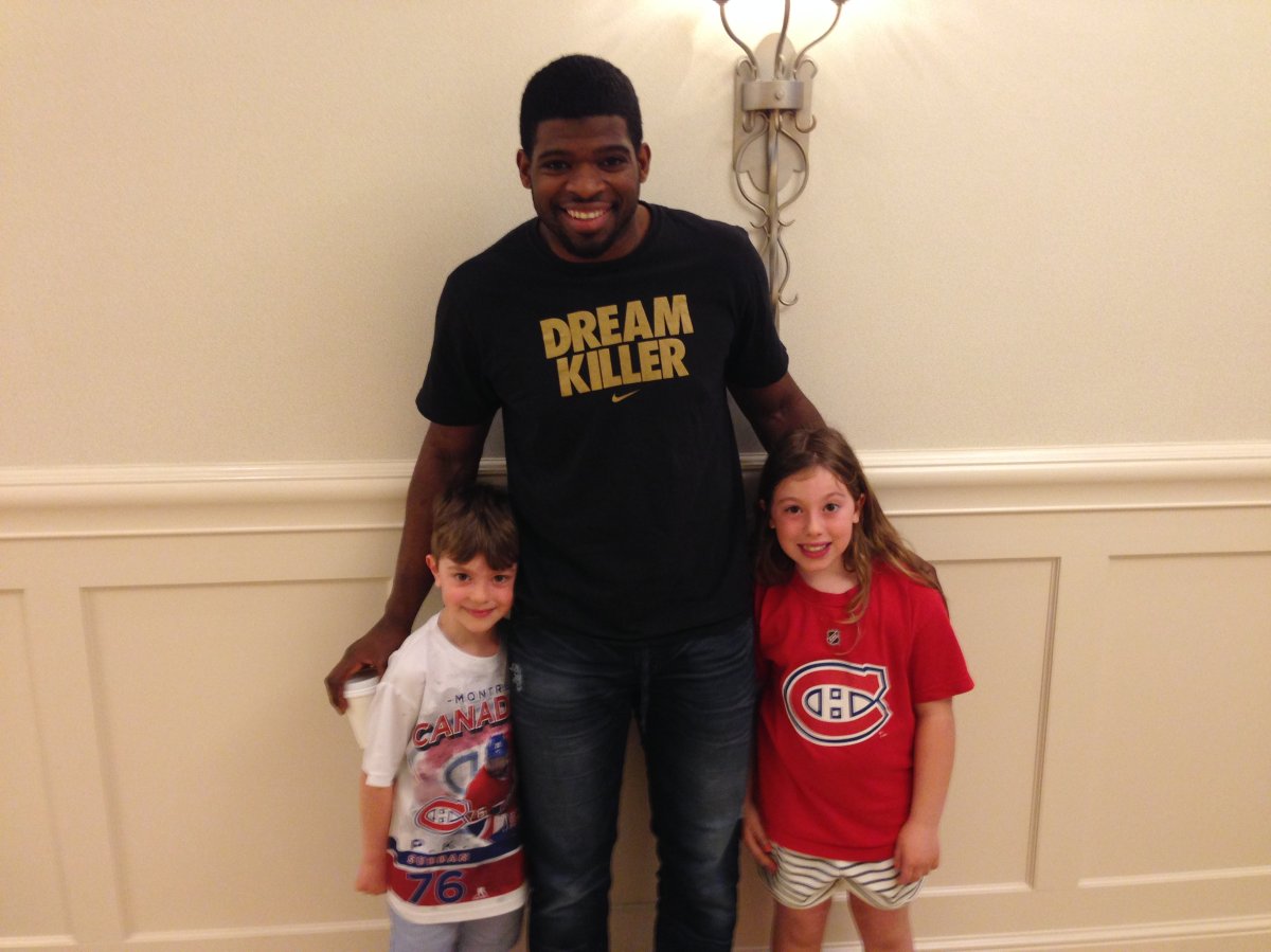 Former Montreal Canadiens defenceman P.K. Subban poses for a photo with Mike Le Couteur's children in Florida, Tuesday, March 17, 2015.