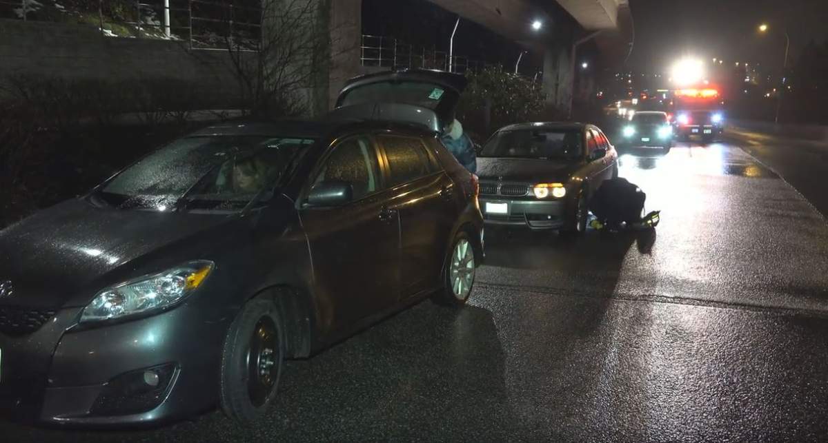 Drivers had to change their tires on the side of the road after hitting the pothole.