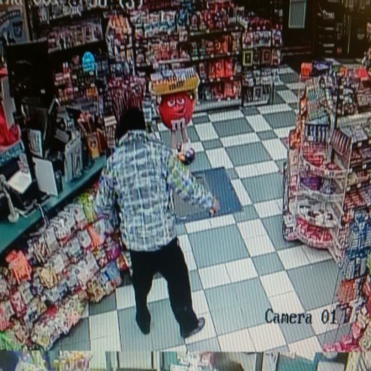 Calgary police need help identifying convenience store robbery suspect - image