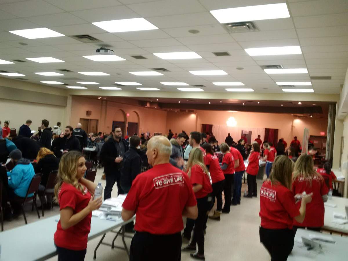 A big crowd of potential stem cell donors getting swabbed at Holy Cross Ukrainian Catholic Parish in north Edmonton. March 9, 2017.
