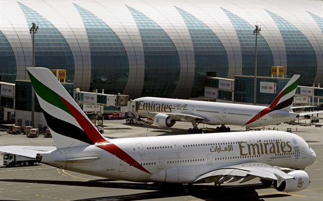 This May 8, 2014 file photo shows Emirates passenger planes at Dubai airport in United Arab Emirates. 