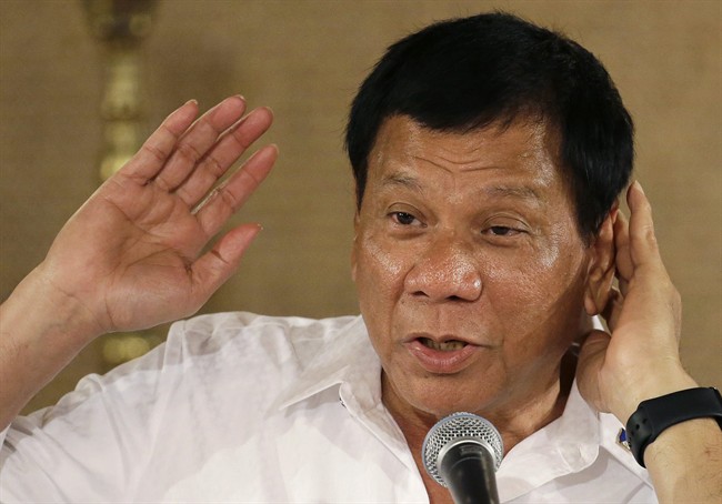 In this March 13, 2017 file photo, Philippine President Rodrigo Duterte gestures as he answers questions from reporters during a press conference at the Malacanang presidential palace in Manila, Philippines. 