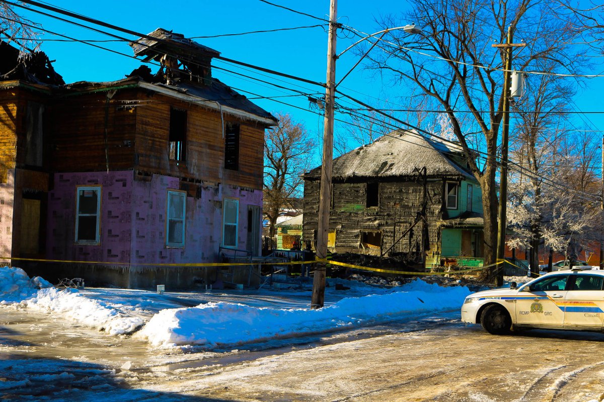 A fire destroyed three vacant buildings, two of which are pictured, in February 2017. 
