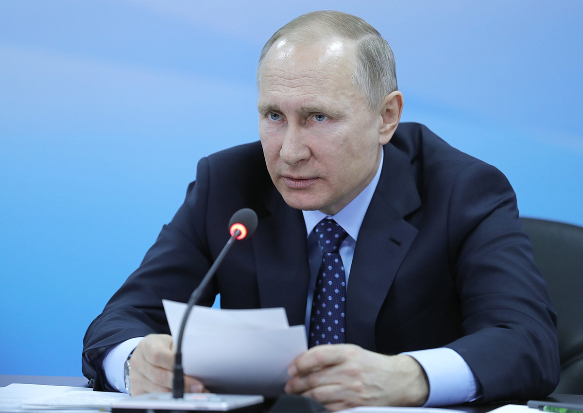 Russia's President Vladimir Putin attends a meeting held at the Congress Hall of the Siberian Federal University.