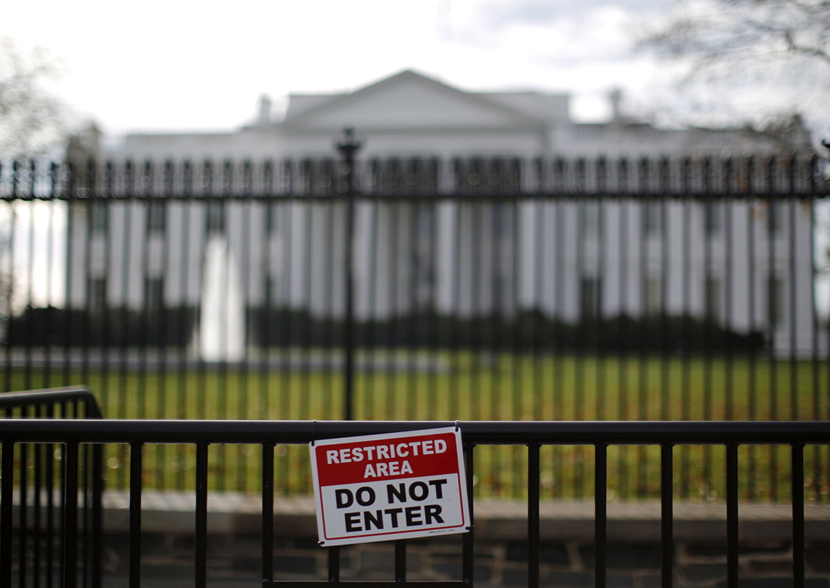 A restricted area sign is seen outside of the White House in Washington November 27, 2015.  