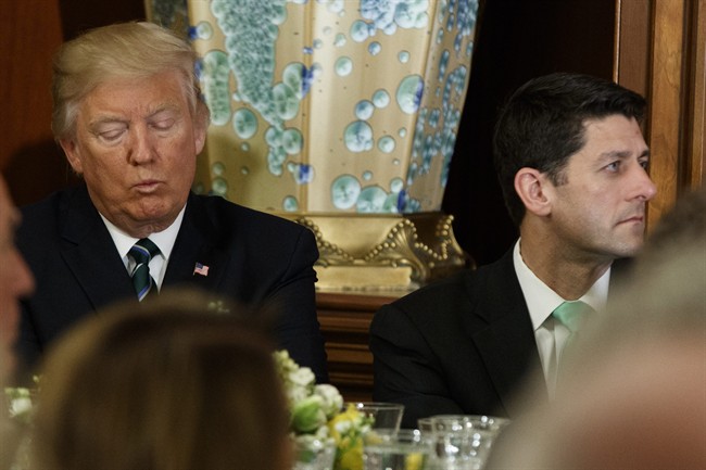 In this March 16, 2017 file photo, President Donald Trump sits with House Speaker Paul Ryan of Wis. on Capitol Hill in Washington. 