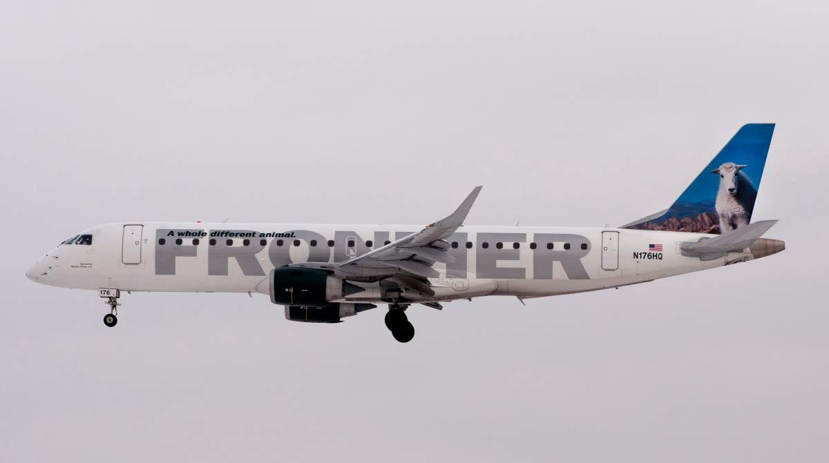 An Embraer 190 (ERJ 190) jetliner, belonging to Frontier Airlines and operated by Republic Airlines, lands at Calgary, Alberta in Jan., 2013.