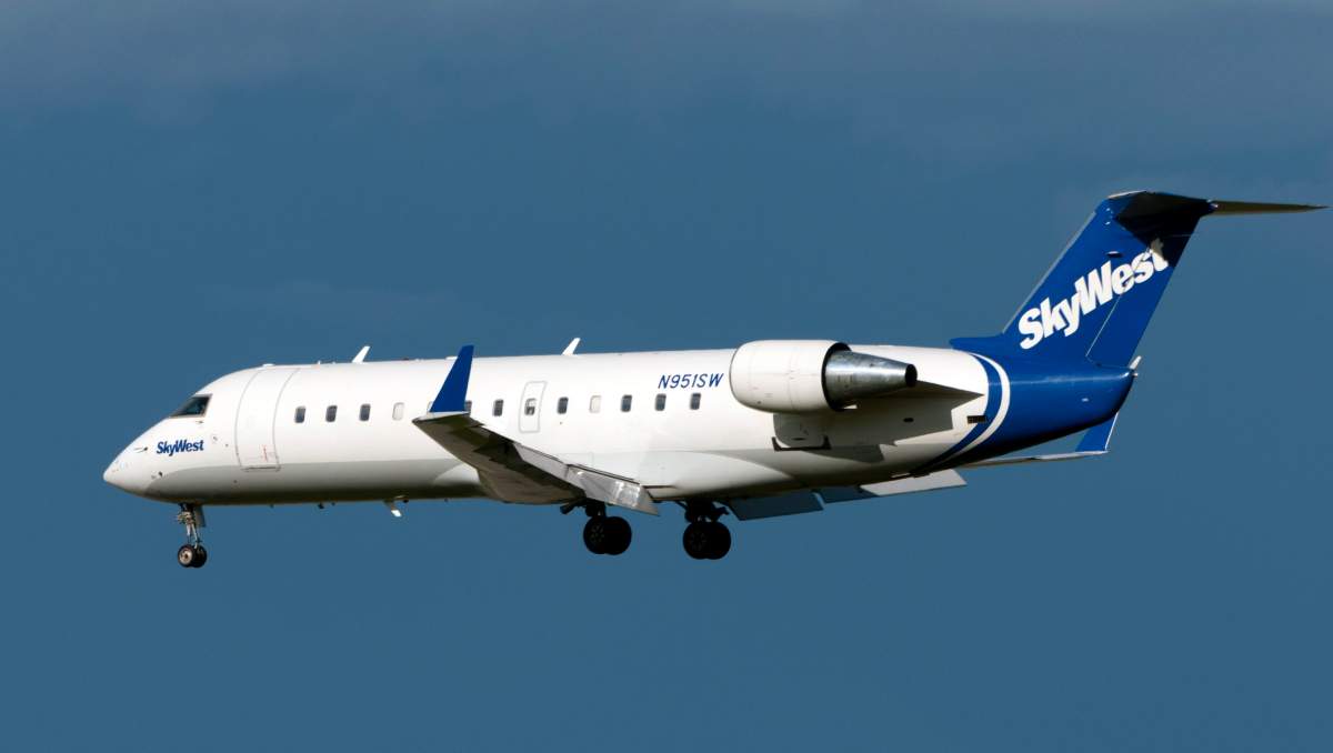 A SkyWest Airlines Bombardier CRJ (CRJ-200) regional jetliner lands at Calgary, Alberta on June 7, 2013.