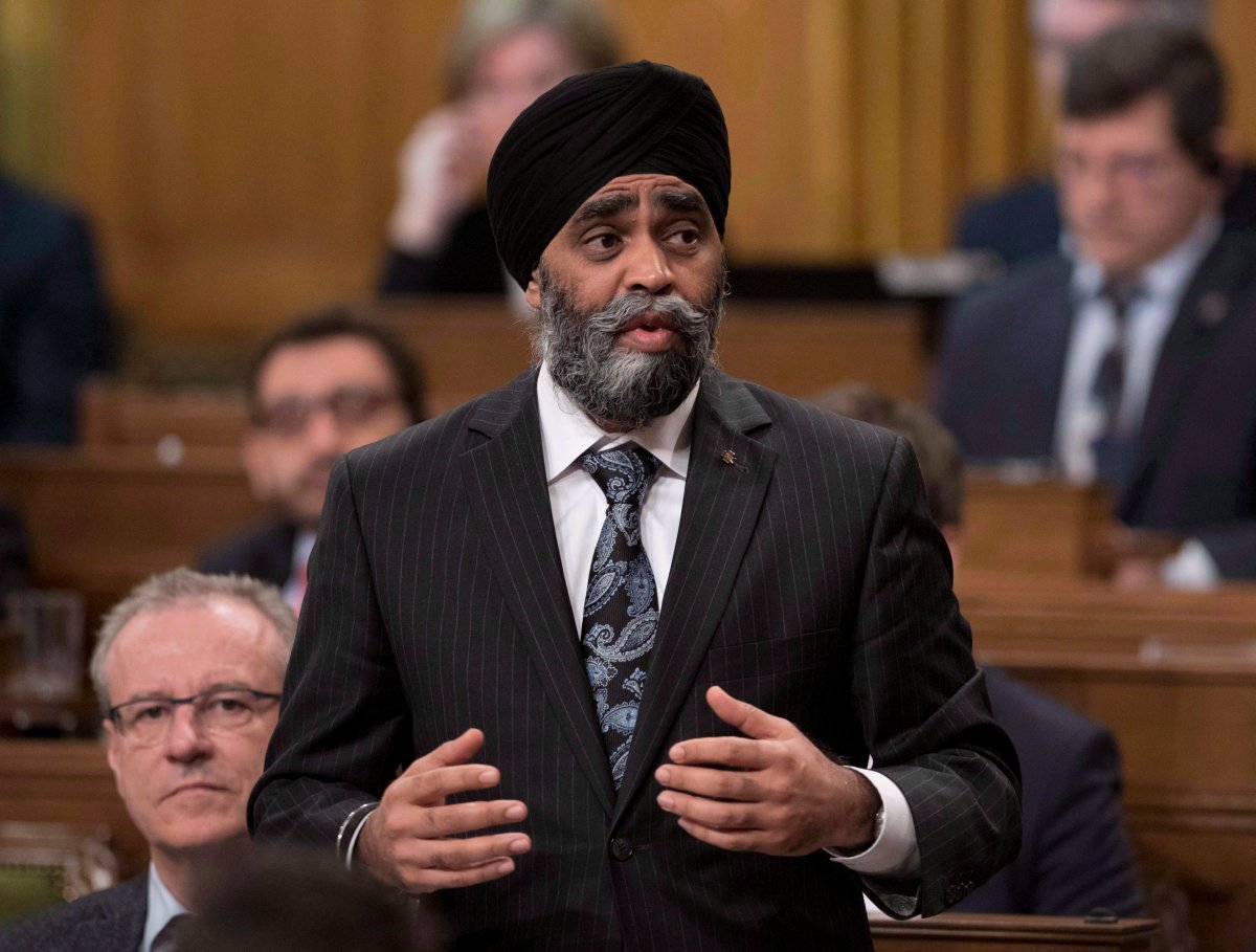 Minister of National Defence Harjit Sajjan rises during Question Period in the House of Commons on Parliament Hill, Friday, April 7, 2017 in Ottawa. 