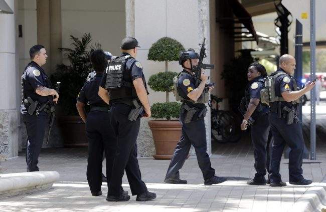 Police patrol outside of the Shops at Merrick Park after the shooting, Saturday, April 8, 2017, in Coral Gables, Fla.   

