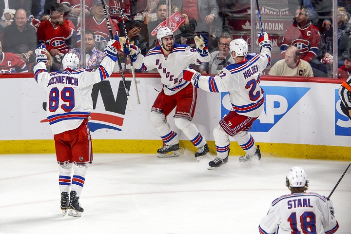 Rangers players celebrate goal by New York Rangers center Mika Zibanejad (93) during the New York Rangers and Montreal Canadiens NHL playoff game at Bell Centre in Montreal, QC. New York defeated Montreal 3-2 in OT. Thursday, April 20, 2017.