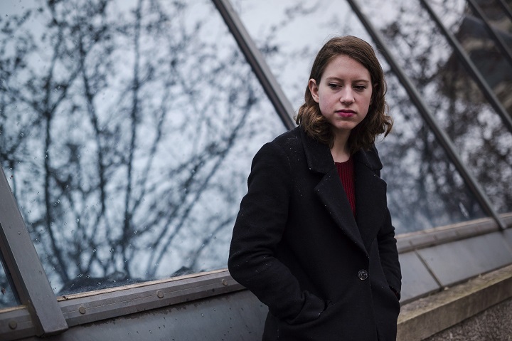 Tamsyn Riddle poses for a portrait in Toronto on Wednesday, April 19, 2017. Tamsyn, who is currently in her third year of studies at the University of Toronto, has opened a human right's complaint against the university over how they handled her sexual assault charge. THE CANADIAN PRESS/Christopher Katsarov.