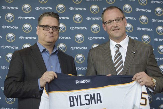The Buffalo Sabres have fired GM Tim Murray (left) and head coach Dan Bylsma.