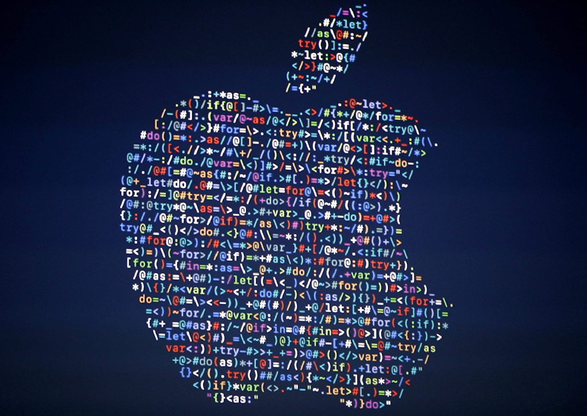 In this June 13, 2016 file photo, The Apple logo is shown on a screen at the Apple Worldwide Developers Conference in the Bill Graham Civic Auditorium, in San Francisc.