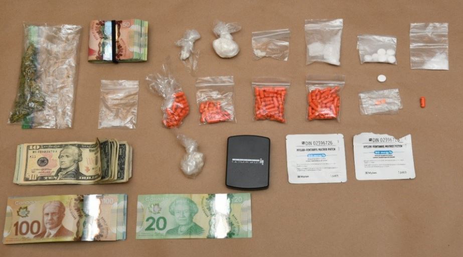 London police charge two people with eight counts after seizing over $6,000 worth of drugs from a Richmond Street residence.