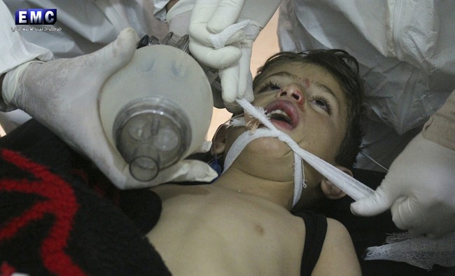 This photo provided by the Syrian anti-government activist group Edlib Media Center, which has been authenticated based on its contents and other AP reporting, shows Syrian doctors treating a child following a suspected chemical attack, at a makeshift hospital, in the town of Khan Sheikhoun, northern Idlib province, Syria. The suspected chemical attack killed dozens of people on Tuesday, Syrian opposition activists said, describing the attack as among the worst in the country’s six-year civil war.