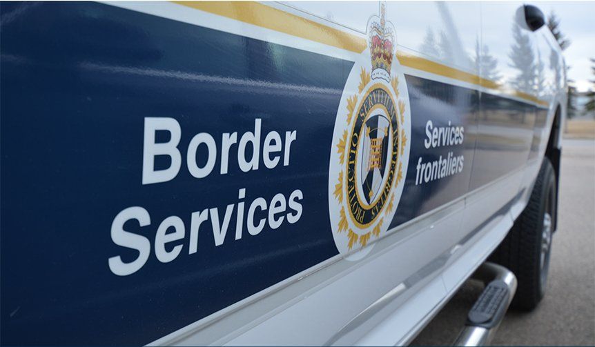 Two truck drivers from Quebec are facing multiple charges after allegedly trying to smuggle 11 people from the United States into Canada.