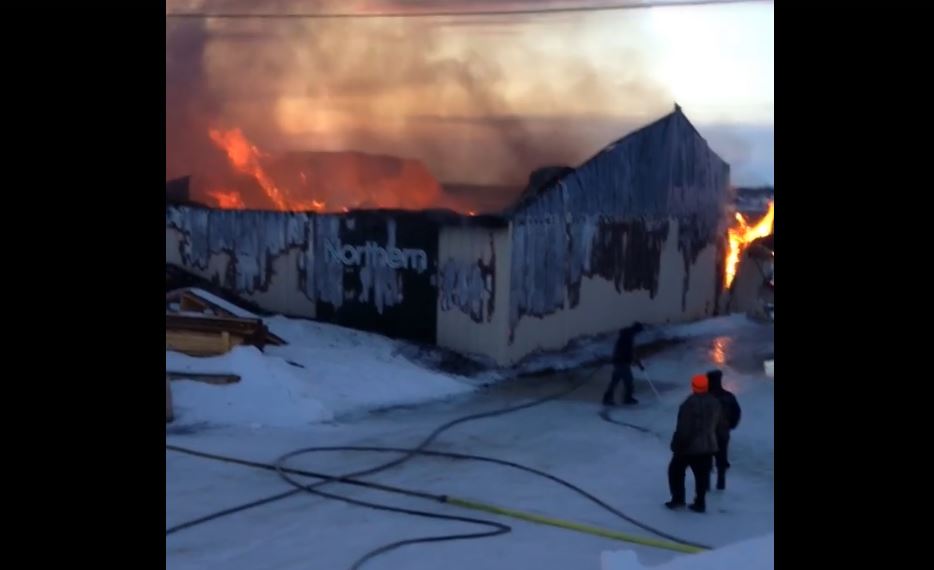 Facebook video shows the grocery store burning down Sunday morning.