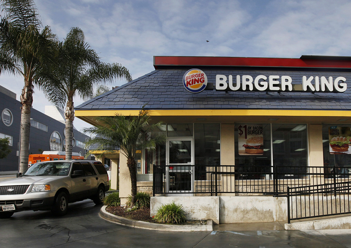 In this Thursday, April 25, 2013, photo, a car stops at the drive-thru at a Burger King restaurant near downtown Los Angeles.