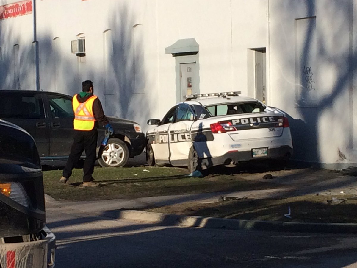 Caught on camera: Car slams into Winnipeg police cruiser - image