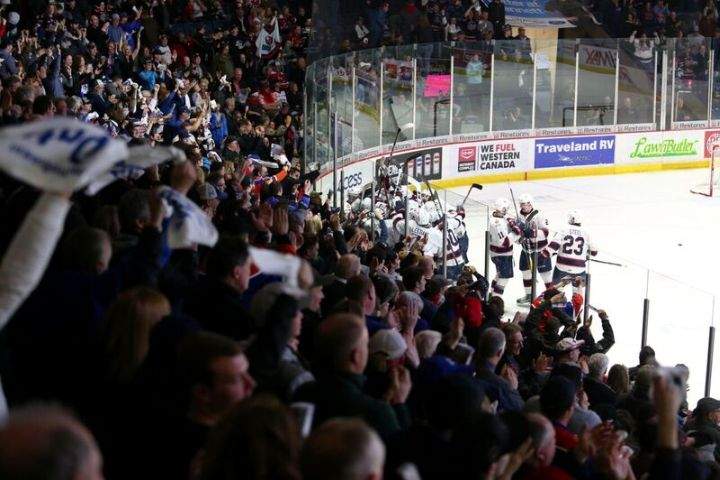 Regina Pats fans celebrate following Pats Captain Adam Brooks game-winning overtime goal. 