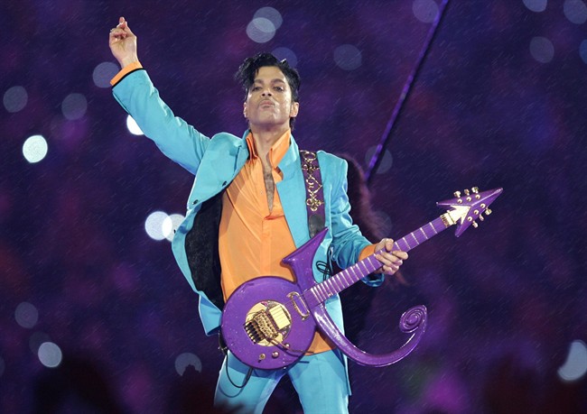 In this Feb. 4, 2007, file photo, Prince performs during the halftime show at the Super Bowl XLI football game in Miami.