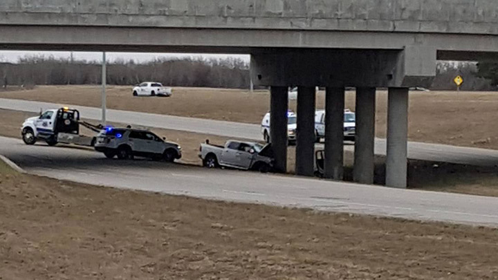 One person is dead after a truck crash head-on into a concrete pillar under the Preston Avenue South overpass on Circle Drive.