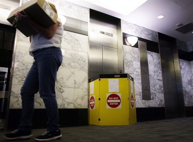 An out-of-service elevator is seen at downtown Toronto building on Thursday, April 27, 2017. Ontario is looking for bidders to do research into elevator reliability and propose solutions. 