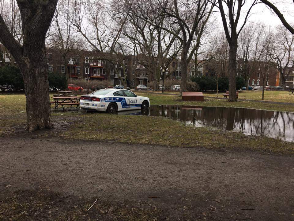 A Montreal police cop car was found stuck in the mud at Baldwin Park in the Plateau, Tuesday, April 12, 2017.