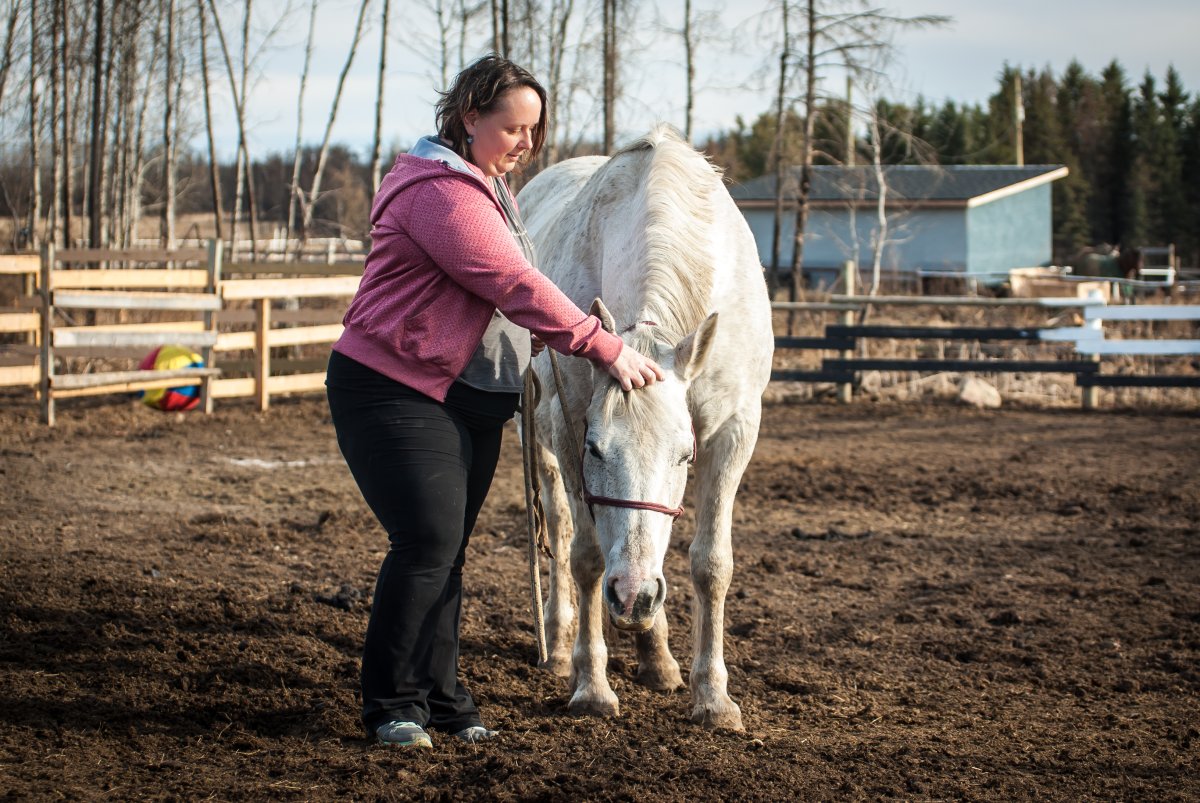 Cora Dion and her family escaped the fire on horseback last May. 