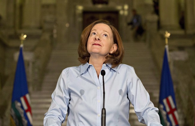 Alberta Premier Alison Redford announces her resignation in Edmonton, Alberta on Wednesday March 19, 2014. Another investigation has cleared former Alberta premier Alison Redford of wrongdoing on how she selected a law firm to sue tobacco companies on behalf of the province. 