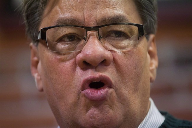 Grand Chief Ed John, Hereditary Chief of Tl'azt'en First Nation and political executive of the First Nations Summit, responds to the Mt. Polley tailings pond breach report during a news conference in Vancouver, B.C., on Tuesday February 3, 2015. First Nations leaders in British Columbia say they suspect the deadly opioid fentanyl is having a disproportionate impact on their communities, but they can't get the numbers to prove it.