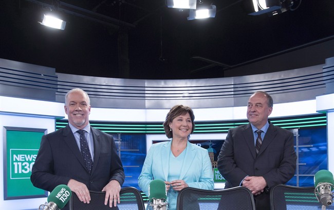 FILE PHOTO: B.C. NDP leader John Horgan, left to right, Liberal Leader Christy Clark and B.C. Green Party leader Andrew Weaver pose for a photo following the leaders radio debate in Vancouver, B.C., April 20, 2017.